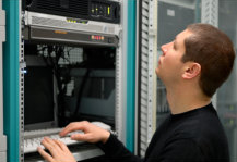 Network administrator checking the router connection