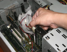 Hand fixing a computer
